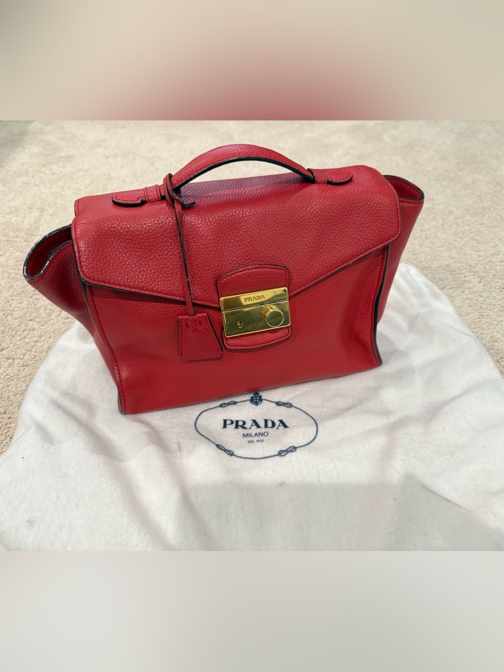 Prada Vitello Daino Leather Sound
Lock Satchel